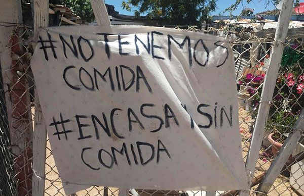 Cuelgan trapos blancos en señal de hambre